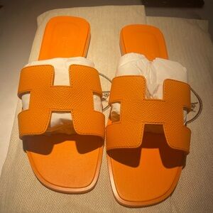 Hermes sandal in orange size 39